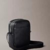 Allover Embossed Emblem Logo Slim Reporter Bag Allover Embossed Emblem Logo Slim Reporter Bag