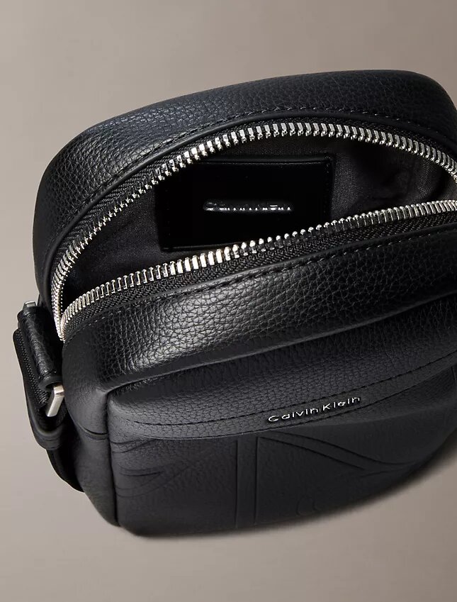 Allover Embossed Emblem Logo Slim Reporter Bag Allover Embossed Emblem Logo Slim Reporter Bag