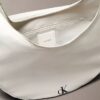 Curved Convertible Crossbody Bag