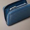 Embossed Allover Monogram Zip Coin Pouch